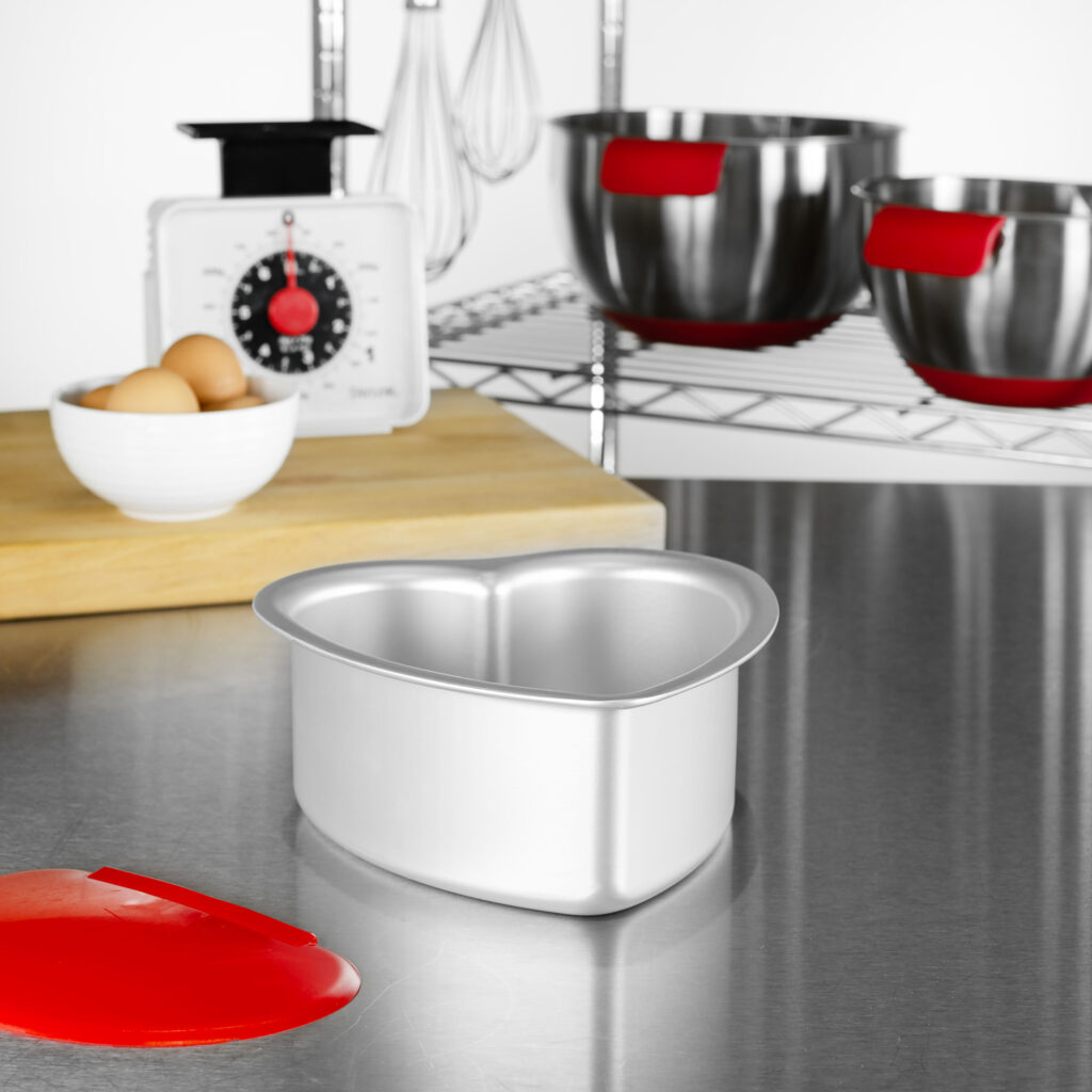 Heart Cake Pan with bowl scraper in a bakery