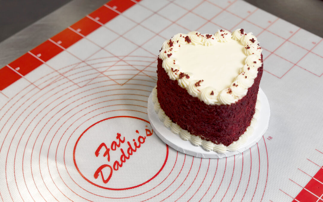 Red Velvet Heart Cake on a Silicone Work Mat in a bakery