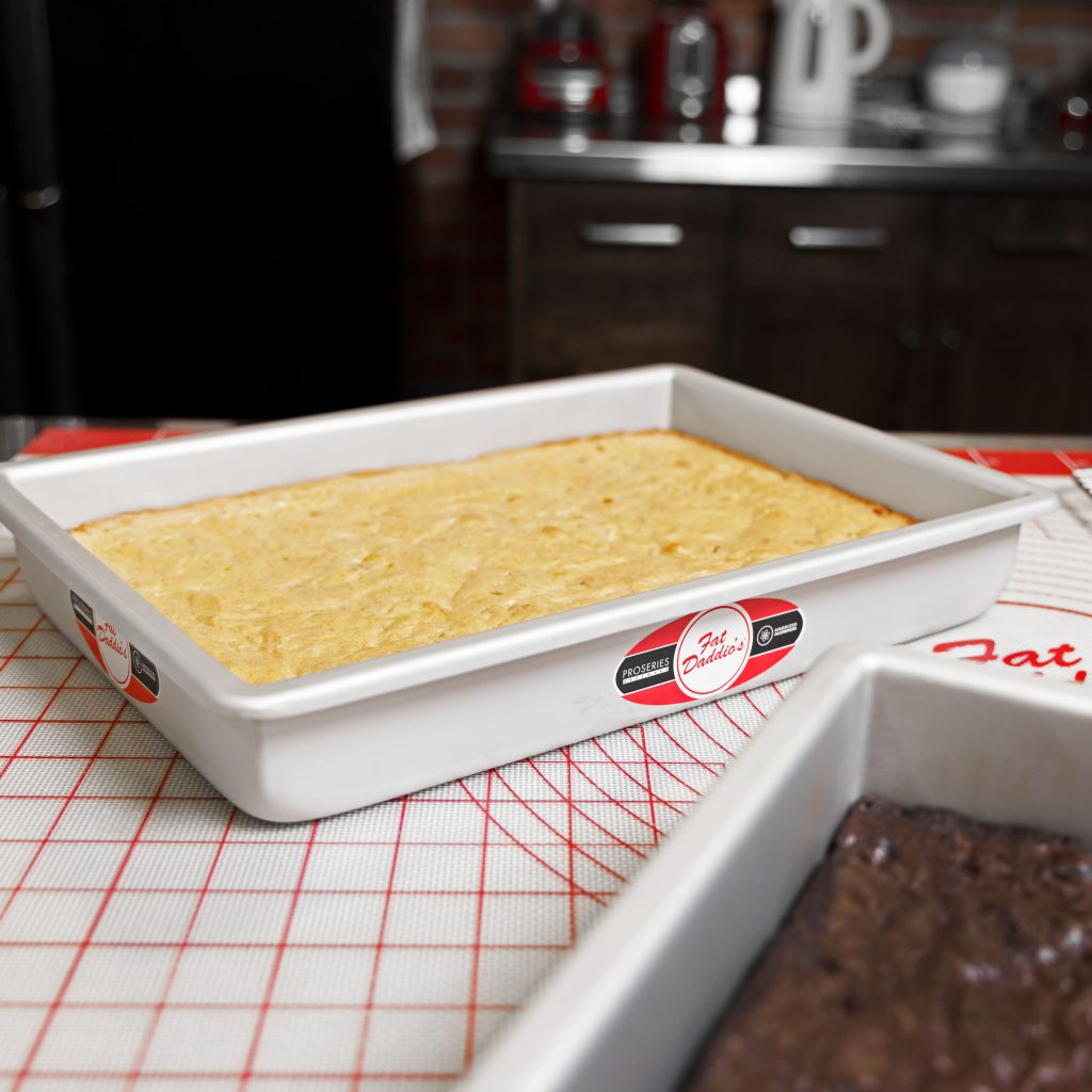 Blondie in a Sheet Cheesecake Pan with removable bottom in a bakery