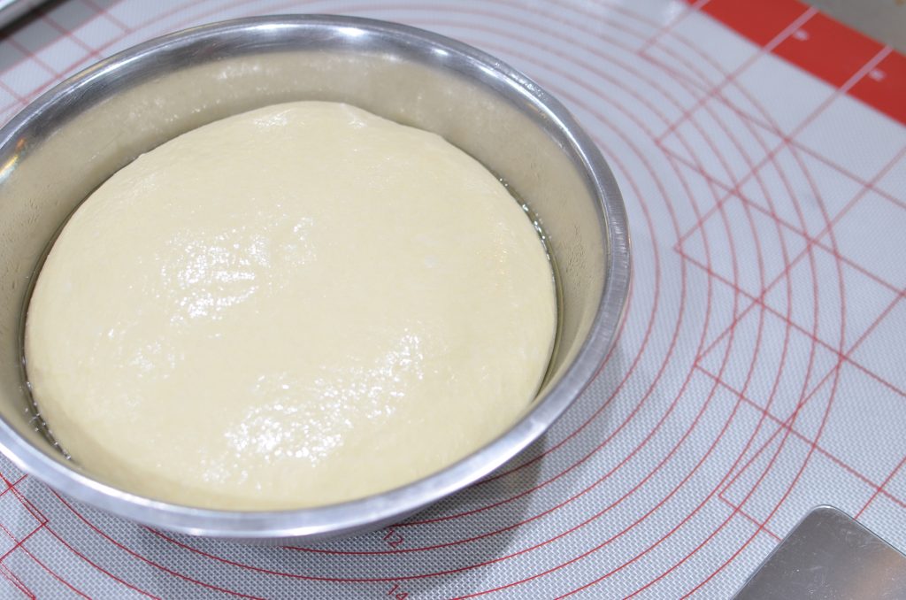 dough proofing in a bowl
