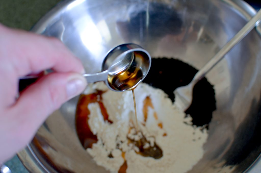 black sesame crisps in a mixing bowl