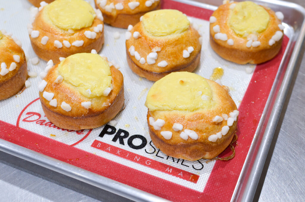 Decorated Torta Della Nonna on a work mat