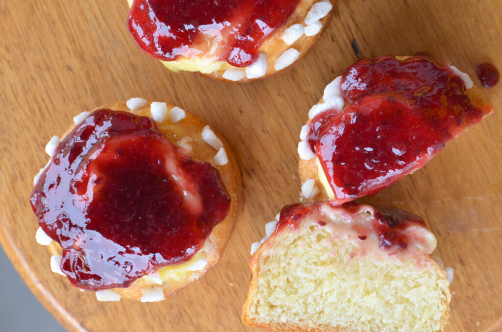 Decorated pastries on a work mat.