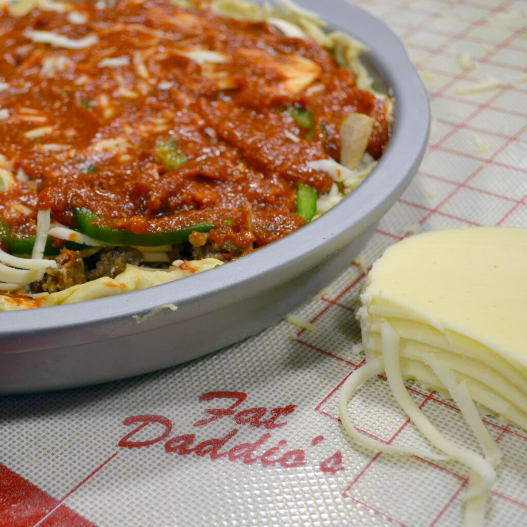Chicago style deep dish pizza in a Fat Daddio's 12 inch by 2 inch deep cake pan