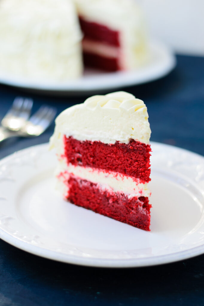slice of red velvet cake on a white plate